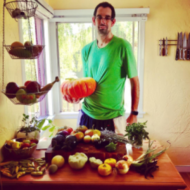 Paul showing off a large pumpkin